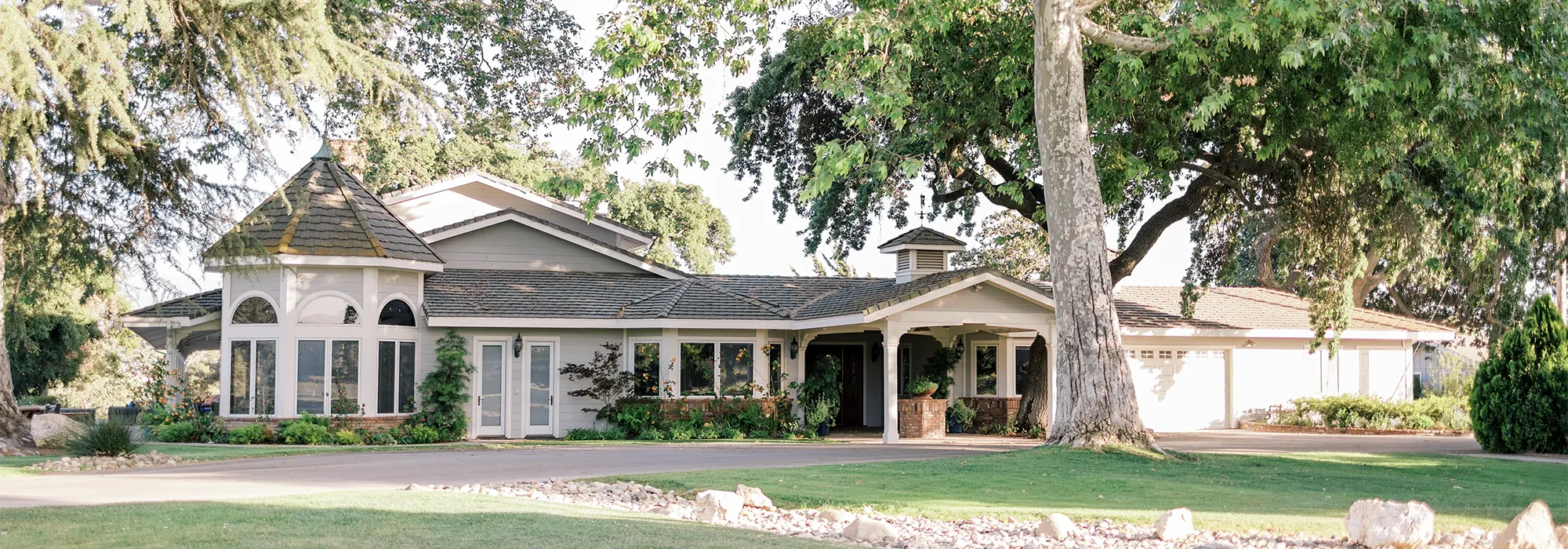 Farmhouse exterior at sunset
